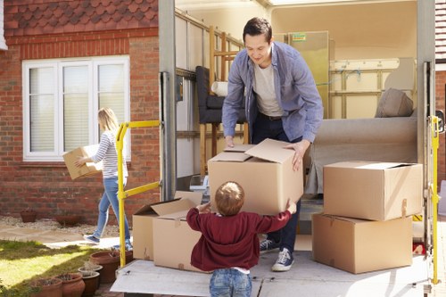 Professional house removals team in Woolwich preparing for a home move